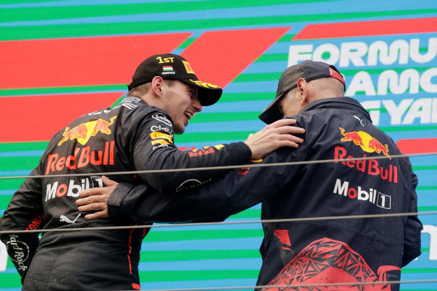 Formula One F1 - Hungarian Grand Prix - Hungaroring, Budapest, Hungary - July 31, 2022
Red Bull's Max Verstappen celebrates on the podium after winning the race with Red Bull Chief Technical Officer Adrian Newey REUTERS/Lisa Leutner