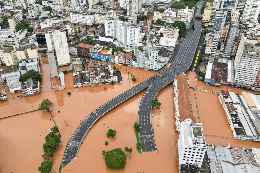 A drone view shows a flooded city center after people were evacuated in Porto Alegre, in Rio Grande do Sul state, Brazil, May 5, 2024. REUTERS/Renan Mattos     TPX IMAGES OF THE DAY