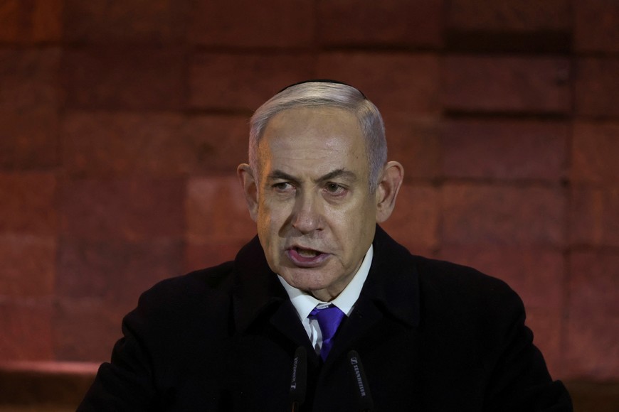 Israeli Prime Minister Benjamin Netanyahu speaks during the opening ceremony marking Israel's national Holocaust Remembrance Day at Yad Vashem, the World Holocaust Remembrance Center, in Jerusalem May 5, 2024. REUTERS/Ronen Zvulun