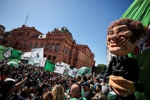 A puppet depicting Argentine President Javier Milei is displayed, as members of the state workers' union (ATE) protest against cuts and layoffs promoted by Argentine President Javier Milei's administration, outside the Casa Rosada presidential palace, in Buenos Aires, Argentina, April 5, 2024. REUTERS/Agustin Marcarian