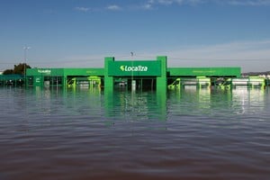 The building of a car rental business is partially submerged amid flooding near the airport in Porto Alegre, Rio Grande do Sul, Brazil, May 6, 2024. REUTERS/Diego Vara