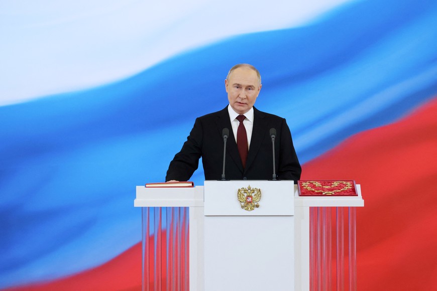 Russian President Vladimir Putin takes the oath of office during his inauguration ceremony at the Kremlin in Moscow, Russia May 7, 2024. Sputnik/Alexander Kazakov/Pool via REUTERS ATTENTION EDITORS - THIS IMAGE WAS PROVIDED BY A THIRD PARTY.