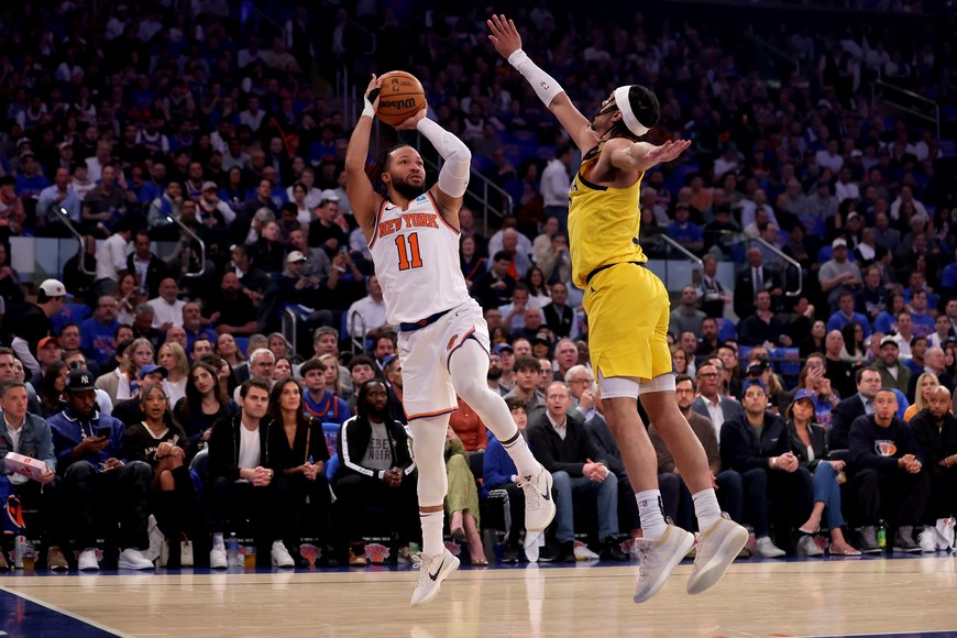 May 6, 2024; New York, New York, USA; New York Knicks guard Jalen Brunson (11) takes a shot against Indiana Pacers guard Andrew Nembhard (2) during the first quarter of game one of the second round of the 2024 NBA playoffs at Madison Square Garden. Mandatory Credit: Brad Penner-USA TODAY Sports