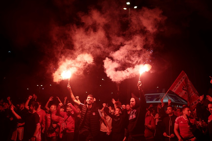 Soccer Football - Europa Conference League - Semi Final - Second Leg - Olympiacos v Aston Villa - Piraeus, Greece - May 9, 2024
Olympiacos fans celebrate with flares in Piraeus after reaching the Europa Conference League final REUTERS/Louiza Vradi