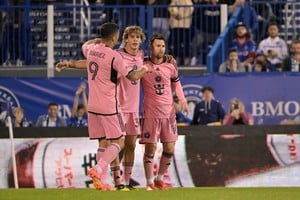 May 11, 2024; Montreal, Quebec, CAN; Inter Miami CF midfielder Benjamin Cremaschi (30) celebrates with forward Luis Suarez (9) and forward Lionel Messi (10) after scoring a goal in the second half against CF Montreal at Stade Saputo. Mandatory Credit: Eric Bolte-USA TODAY Sports