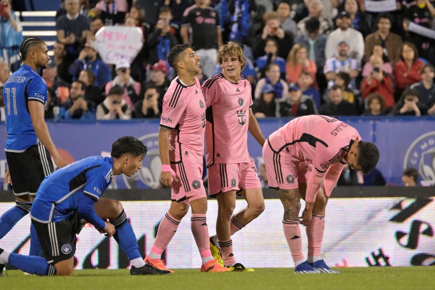 May 11, 2024; Montreal, Quebec, CAN; Inter Miami CF midfielder Benjamin Cremaschi (30) celebrates with forward Luis Suarez (9) after scoring a goal against CF Montreal in the second half at Stade Saputo. Mandatory Credit: Eric Bolte-USA TODAY Sports