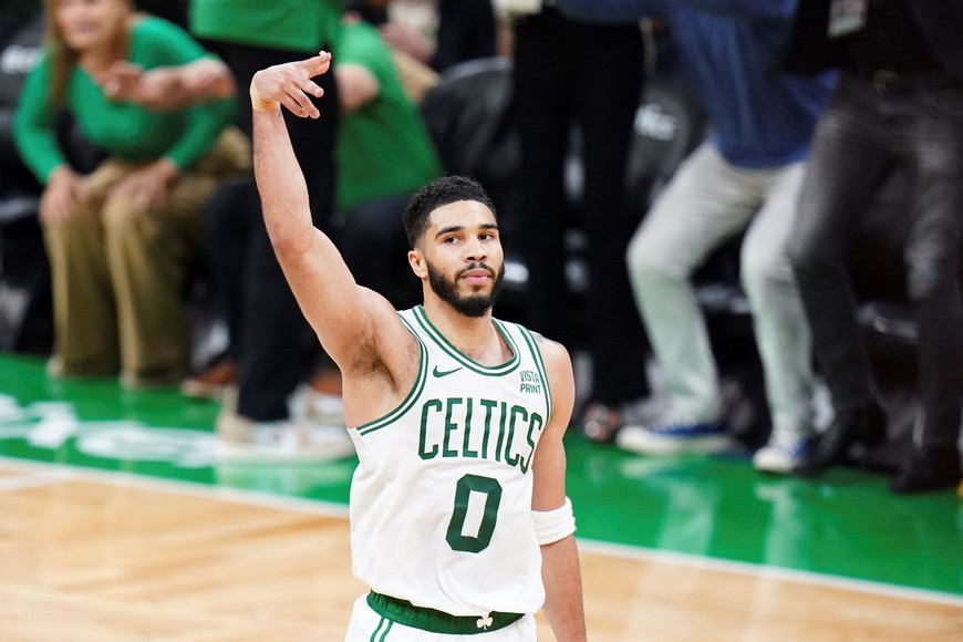 May 21, 2024; Boston, Massachusetts, USA; Boston Celtics forward Jayson Tatum (0) reacts after his three point basket against the Indiana Pacers in over-time during game one of the eastern conference finals for the 2024 NBA playoffs at TD Garden. Mandatory Credit: David Butler II-USA TODAY Sports