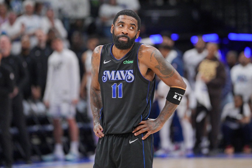 May 24, 2024; Minneapolis, Minnesota, USA; Dallas Mavericks guard Kyrie Irving (11) reacts in the fourth quarter against the Minnesota Timberwolves in game two of the western conference finals for the 2024 NBA playoffs at Target Center. Mandatory Credit: Brad Rempel-USA TODAY Sports