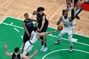 Jun 6, 2024; Boston, Massachusetts, USA; Boston Celtics forward Jayson Tatum (0) shoots the ball against the Dallas Mavericks during the second half of game one of the 2024 NBA Finals at TD Garden. Mandatory Credit: Peter Casey-USA TODAY Sports