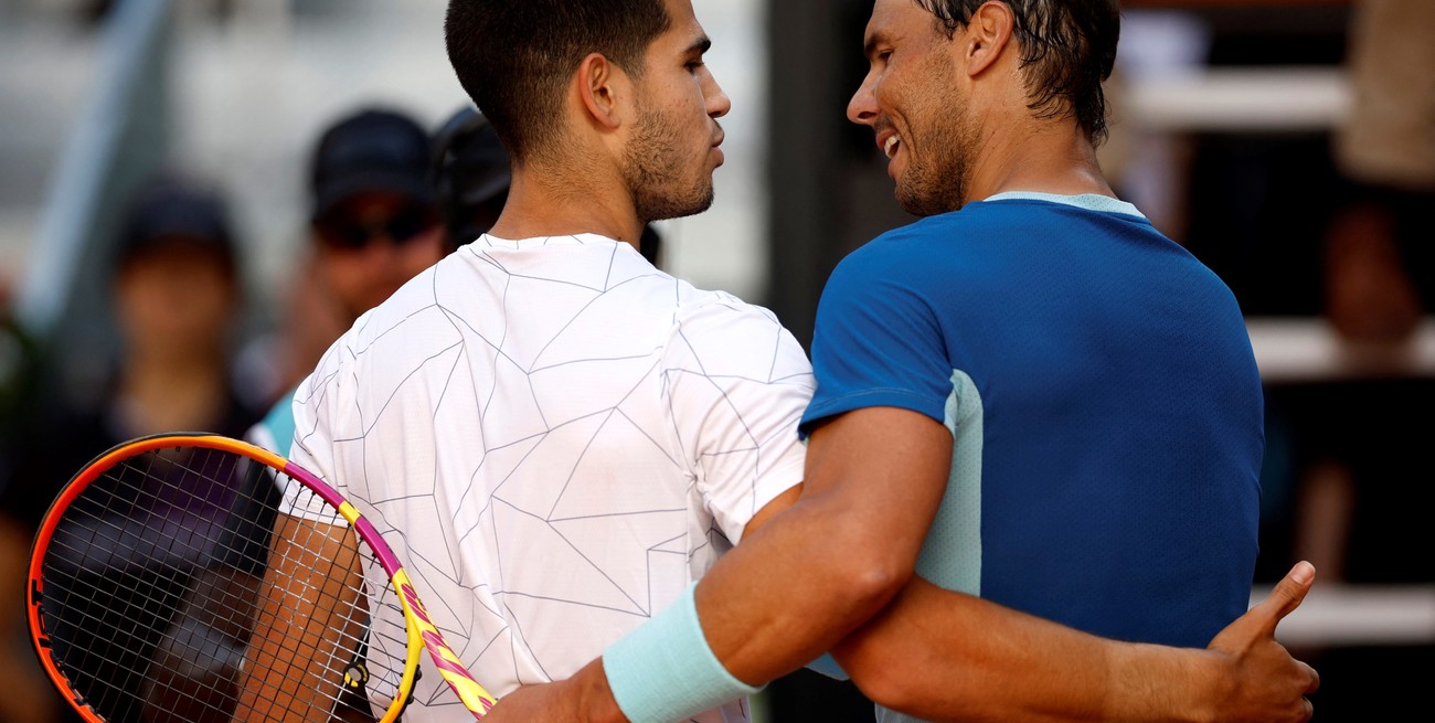 Tennis - ATP Masters 1000 - Madrid Open - Caja Magica, Madrid, Spain - May 6, 2022
Spain's Carlos Alcaraz Garfia with Spain's Rafael Nadal after their quarter final match REUTERS/Juan Medina