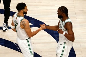 Jun 12, 2024; Dallas, Texas, USA; Boston Celtics forward Jayson Tatum (0) and guard Jaylen Brown (7) celebrate after defeating the Dallas Mavericks in game three of the 2024 NBA Finals at American Airlines Center. Mandatory Credit: Peter Casey-USA TODAY Sports