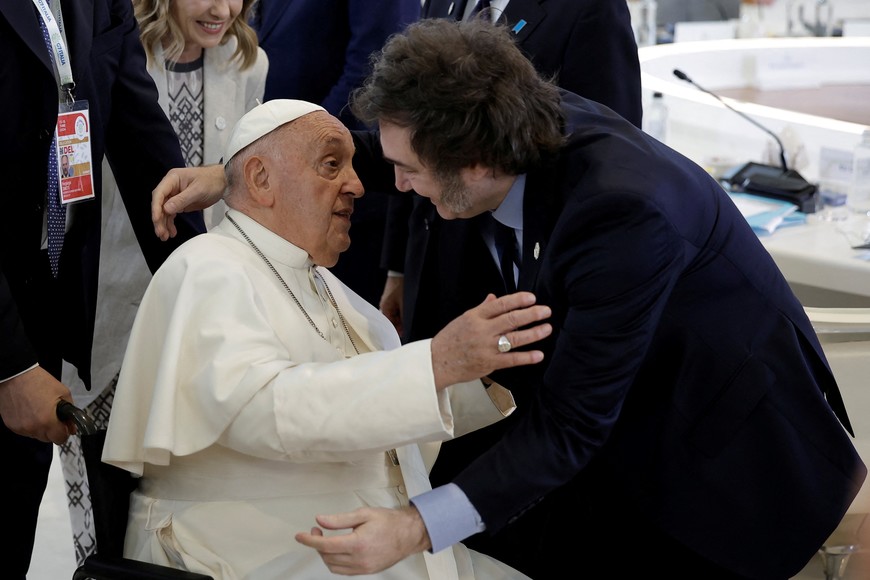 Pope Francis and Argentina's President Javier Milei talk ahead of a session on Artificial Intelligence (AI), Energy, Africa and Mediterranean on the second day of the G7 summit in Borgo Egnazia, Italy, June 14, 2024. REUTERS/Louisa Gouliamaki