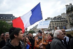People attend a demonstration against anti-Semitism in front of Paris City Hall after three teenagers aged 12 to 13 indicted in Courbevoie, accused of rape and anti-Semitic violence against a 12-year-old girl, in Paris, France, June 19, 2024. The slogan reads "It could have been your sister".  REUTERS/Dylan Martinez
