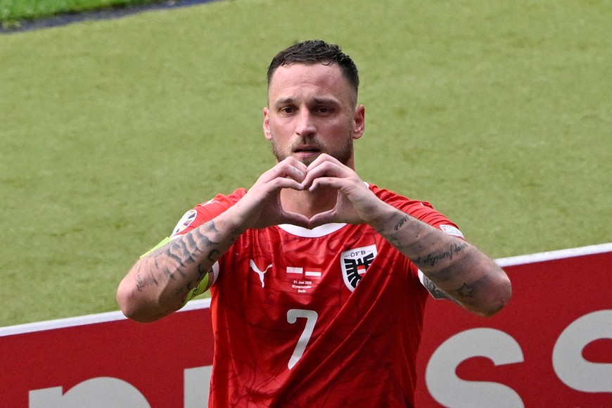 Soccer Football - Euro 2024 - Group D - Poland v Austria - Berlin Olympiastadion, Berlin, Germany - June 21, 2024
Austria's Marko Arnautovic celebrates scoring their third goal REUTERS/Fabian Bimmer