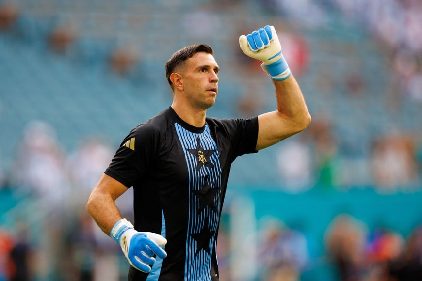 Jun 29, 2024; Miami, FL, USA;  goalkeeper Emiliano Martínez (23) takes the field for warm ups before a Copa America group stage match against Peru at Hard Rock Stadium. Mandatory Credit: Nathan Ray Seebeck-USA TODAY Sports