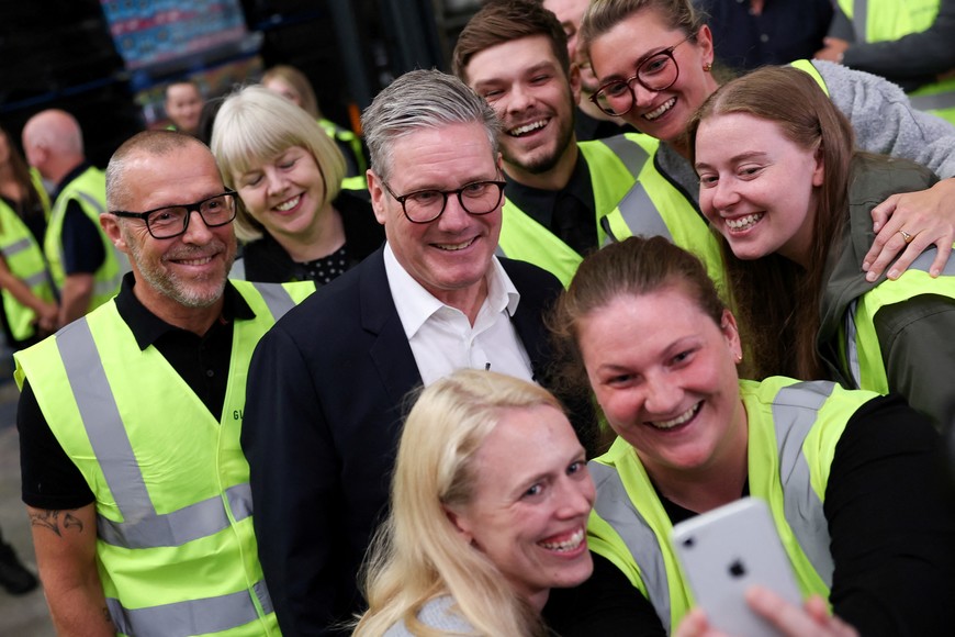British opposition Labour Party leader Keir Starmer poses for a picture during a Labour general election campaign event, in Clay Cross, Britain July 2, 2024. REUTERS/Claudia Greco