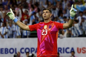 Soccer Football - Copa America 2024 - Quarter Final - Argentina v Ecuador - NRG Stadium, Houston, Texas, United States - July 4, 2024
Argentina's Emiliano Martinez reacts during the penalty shootout REUTERS/Agustin Marcarian