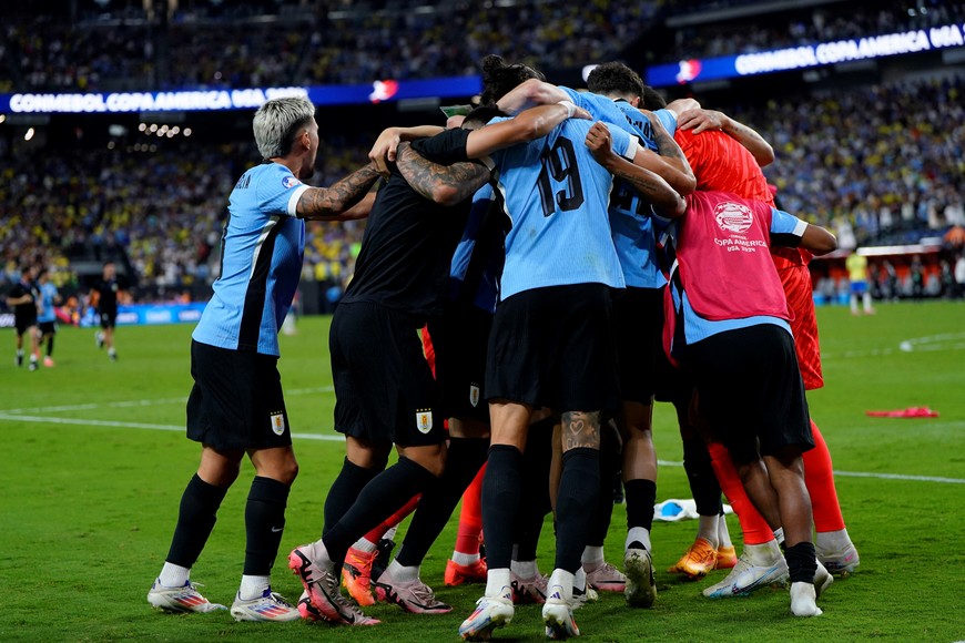 Jul 6, 2024; Las Vegas, NV, USA; Uruguay celebrates after defeating Brazil at Allegiant Stadium. Mandatory Credit: Lucas Peltier-USA TODAY Sports