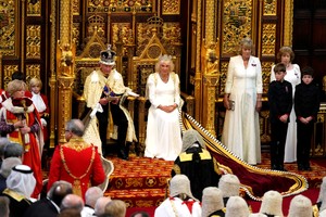 King Charles III sits alongside Britain's Queen Camilla, wearing the George IV State Diadem, during the State Opening of Parliament, in London, Wednesday, July 17, 2024.    Kirsty Wigglesworth/Pool via REUTERS