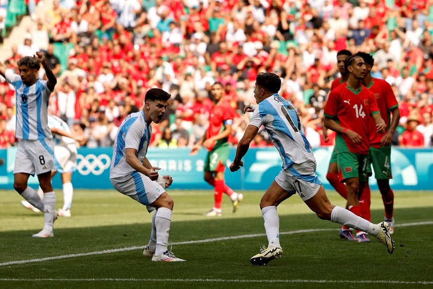 Paris 2024 Olympics - Football - Men's Group B - Argentina vs Morocco - Geoffroy-Guichard Stadium, Saint-Etienne, France - July 24, 2024.
Giuliano Simeone of Argentina celebrates scoring their first goal with Julian Alvarez of Argentina REUTERS/Thaier Al-Sudani