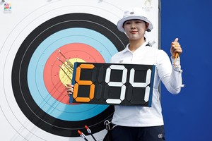 Paris 2024 Olympics - Archery - Women's Individual Ranking Round - Invalides, Paris, France - July 25, 2024.
Sihyeon Lim of South Korea reacts. REUTERS/Tingshu Wang