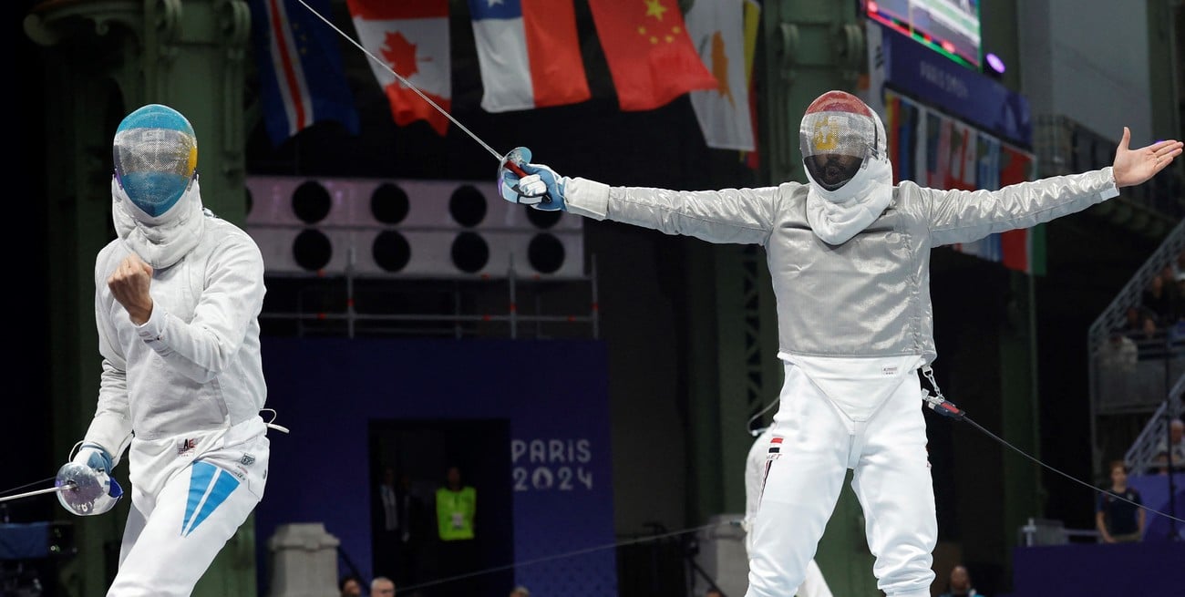 Paris 2024 Olympics - Fencing - Men's Sabre Individual Table of 32 - Grand Palais, Paris, France - July 27, 2024.
Pascual Maria di Tella of Argentina and Ziad Elsissy of Egypt react. REUTERS/Albert Gea