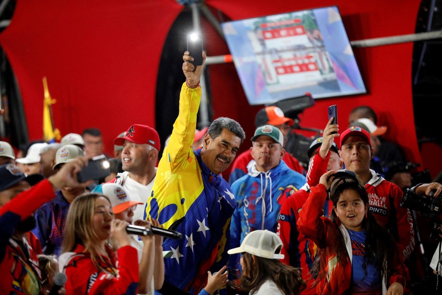 Venezuelan President Nicolas Maduro celebrates after the presidential election in Caracas, Venezuela July 29, 2024.  REUTERS/Fausto Torrealba     TPX IMAGES OF THE DAY