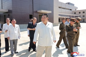 North Korean leader Kim Jong Un smiles while on a visit to the construction sites of various North Korean industrial factories on Saturday and Sunday, at an undisclosed location in North Korea, in this undated photo released by North Korea's official Korean Central News Agency August 26, 2024.    KCNA via REUTERS    ATTENTION EDITORS - THIS IMAGE WAS PROVIDED BY A THIRD PARTY. REUTERS IS UNABLE TO INDEPENDENTLY VERIFY THIS IMAGE. NO THIRD PARTY SALES. SOUTH KOREA OUT. NO COMMERCIAL OR EDITORIAL SALES IN SOUTH KOREA.