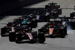 Formula One F1 - Azerbaijan Grand Prix - Baku City Circuit, Baku, Azerbaijan - September 15, 2024
Ferrari's Charles Leclerc leads  the field at the start of the race REUTERS/Maxim Shemetov