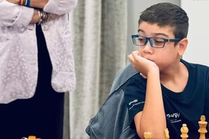 Chessi, como lo bautizaron en España, durante su participación en el tradicional certamen. 
FEDA (Federación española de ajedrez)