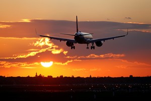 A Turkish Airlines aircraft lands during sunset at Tegel Airport, which is expected to shut permanently on November 8, in Berlin, Germany October 22, 2020. REUTERS/Fabrizio Bensch