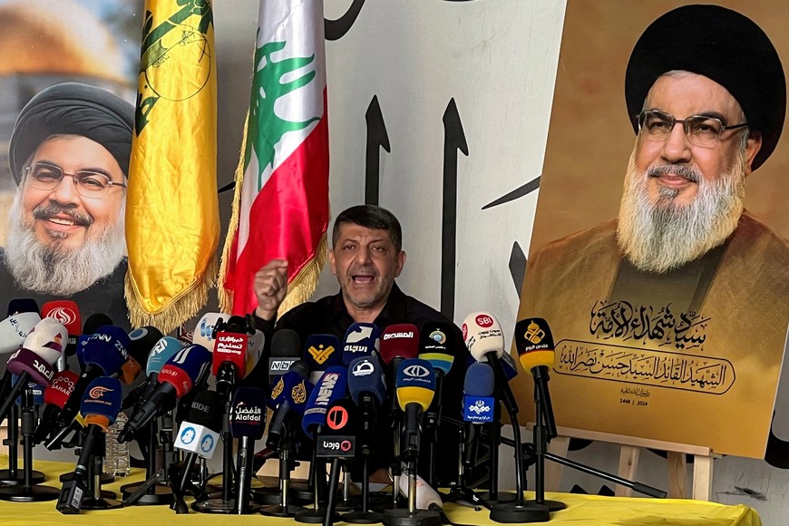 FILE PHOTO: The head of Hezbollah's media office, Mohammad Afif, speaks during a press conference in Beirut's southern suburbs in Lebanon, amid the ongoing hostilities between Hezbollah and Israeli forces, November 11, 2024. REUTERS/Haider Kadhim/File Photo