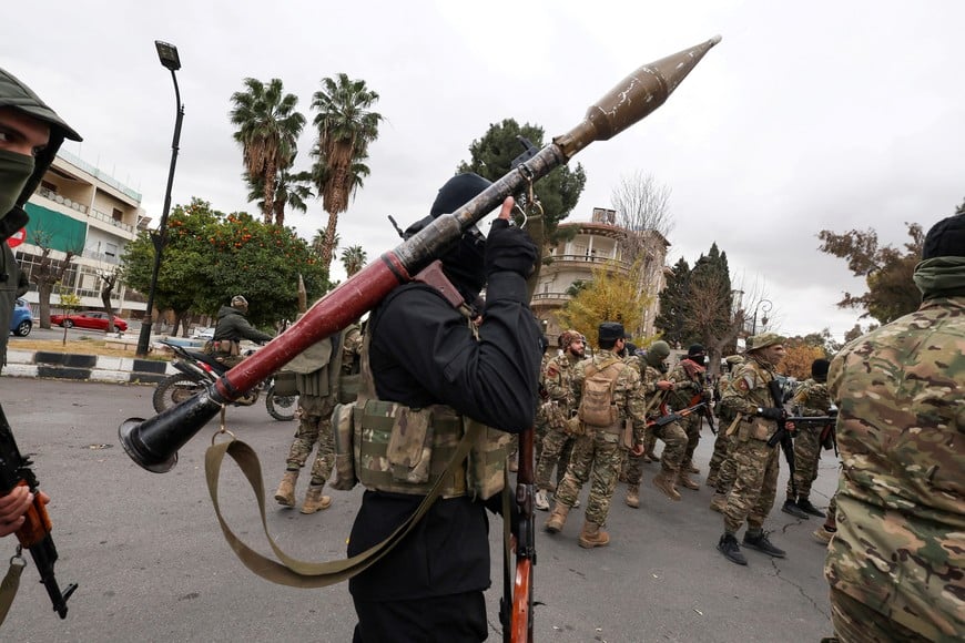 FILE PHOTO: Khaled Brigade, a part of Hay'at Tahrir al-Sham (HTS), hold a military parade, after Syria's Bashar al-Assad was ousted, in Damascus, Syria, December 27, 2024. REUTERS/Amr Abdallah Dalsh/File Photo