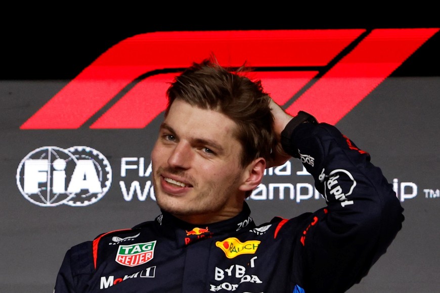 Formula One F1 - Qatar Grand Prix - Lusail International Circuit, Lusail, Qatar - December 1, 2024 
Red Bull's Max Verstappen celebrates on the podium after winning the Qatar Grand Prix REUTERS/Hamad I Mohammed