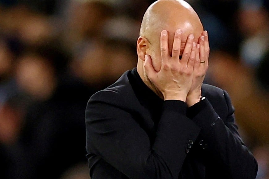 Soccer Football - Champions League - Quarter Final - Second Leg - Manchester City v Real Madrid - Etihad Stadium, Manchester, Britain - April 17, 2024
Manchester City manager Pep Guardiola reacts 
REUTERS/Carl Recine