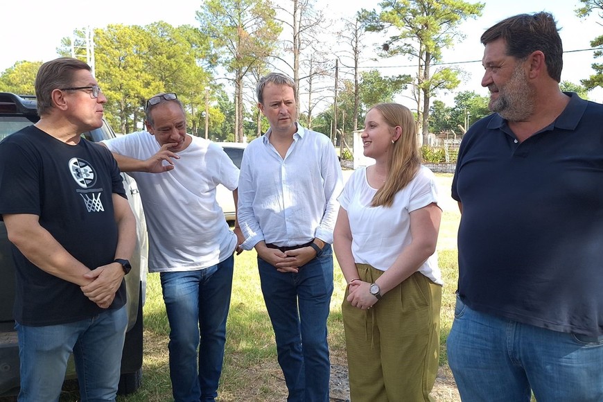 Tejeda junto a Borla y autoridades de la institución.