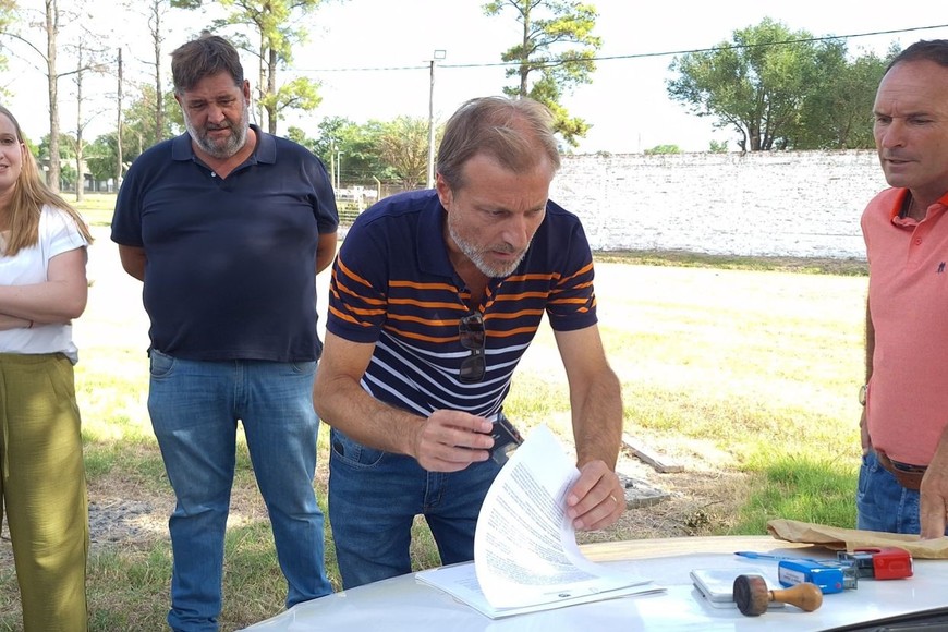 Tejeda junto a Borla y autoridades de la institución.