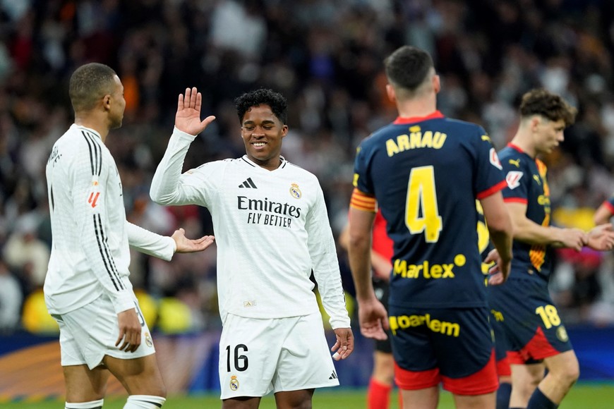 Soccer Football - LaLiga - Real Madrid v Girona - Santiago Bernabeu, Madrid, Spain - February 23, 2025
Real Madrid's Kylian Mbappe and Endrick celebrate after the match REUTERS/Ana Beltran