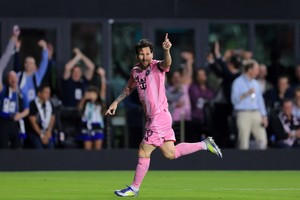 Feb 25, 2025; Fort Lauderdale, Florida, USA; Inter Miami CF forward Lionel Messi (10) celebrates after scoring against Sporting Kansas City during the first half in Round One of the 2025 Concacaf Champions Cup at Chase Stadium. Mandatory Credit: Sam Navarro-Imagn Images