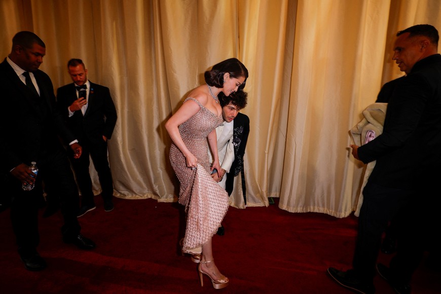 Selena Gomez adjusts her dress on the red carpet during the Oscars arrivals at the 97th Academy Awards in Hollywood, Los Angeles, California, U.S., March 2, 2025. REUTERS/Mike Blake