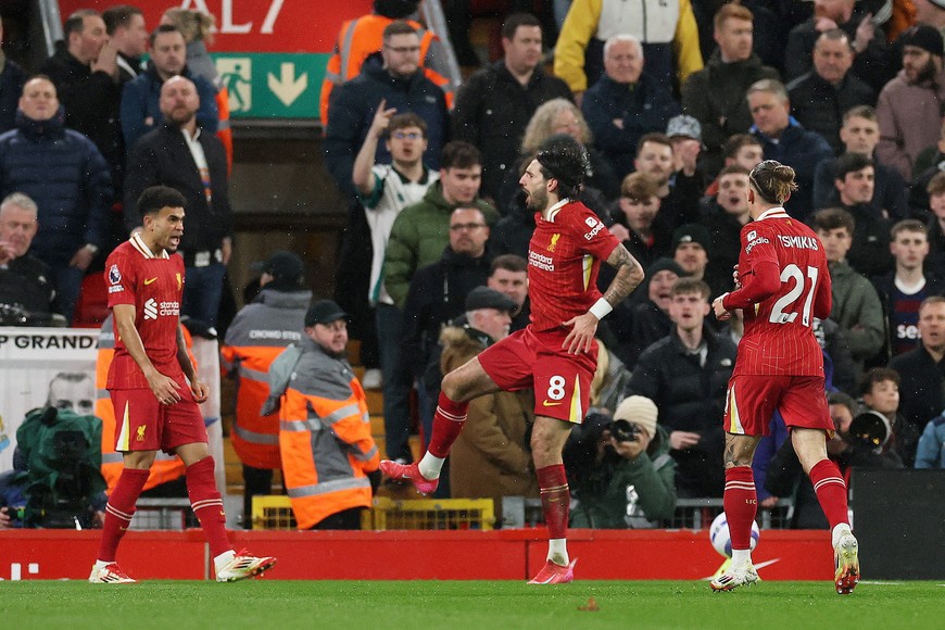 Soccer Football - Premier League - Liverpool v Newcastle United - Anfield, Liverpool, Britain - February 26, 2025
Liverpool's Dominik Szoboszlai celebrates scoring their first goal REUTERS/Phil Noble EDITORIAL USE ONLY. NO USE WITH UNAUTHORIZED AUDIO, VIDEO, DATA, FIXTURE LISTS, CLUB/LEAGUE LOGOS OR 'LIVE' SERVICES. ONLINE IN-MATCH USE LIMITED TO 120 IMAGES, NO VIDEO EMULATION. NO USE IN BETTING, GAMES OR SINGLE CLUB/LEAGUE/PLAYER PUBLICATIONS. PLEASE CONTACT YOUR ACCOUNT REPRESENTATIVE FOR FURTHER DETAILS..