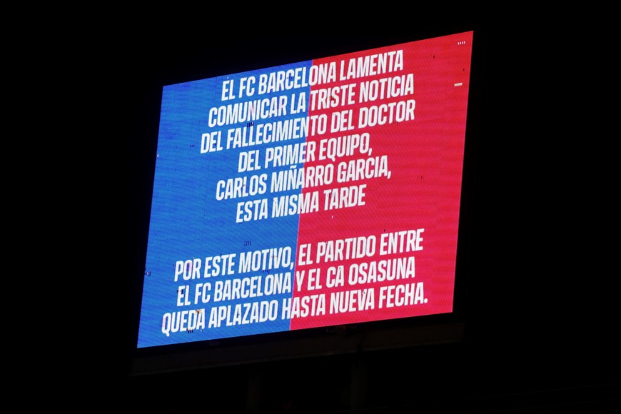 Soccer Football - LaLiga - FC Barcelona v Osasuna - Estadi Olimpic Lluis Companys, Barcelona, Spain - March 8, 2025
A message is displayed on the screen advising that the match has been postponed due to the death of Carlos Minarro Garcia, a member of FC Barcelona's medical staff REUTERS/Albert Gea