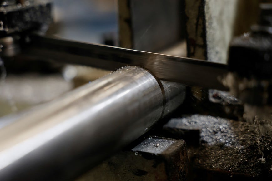 A steel bar is cut at a metal-mechanical parts factory with application to industry, as U.S. President Donald Trump will impose tariffs on steel and aluminum, in Apodaca, Mexico, March 11, 2025. REUTERS/Daniel Becerril