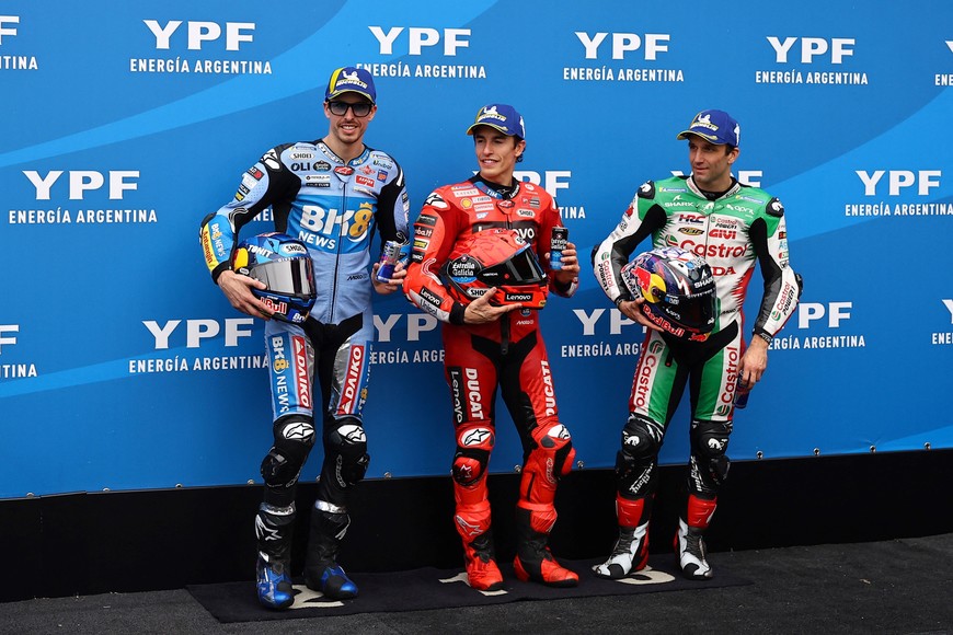MotoGP - Argentina Grand Prix - Autodromo Termas de Rio Hondo, Santiago del Estero, Argentina - March 15, 2025
Ducati Lenovo Team's Marc Marquez celebrates after qualifying in first place alongside second placed BK8 Gresini Racing MotoGP's Alex Marquez and third placed LCR Honda's Johann Zarco REUTERS/Agustin Marcarian