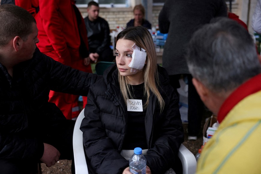 Marija Taseva, a survivor who lost her sister, reacts outside a hospital, following a fire in a night club resulting in casualties, in the town of Kocani, North Macedonia, March 16, 2025. REUTERS/Alexandros Avramidis