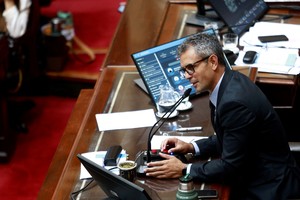 Argentina's President of the Chamber of Deputies Martin Menem speaks as lawmakers debate a decree issued by President Javier Milei's government on a potential new deal between Argentina and the IMF, at Argentina's National Congress in Buenos Aires, Argentina March 19, 2025. REUTERS/Matias Baglietto