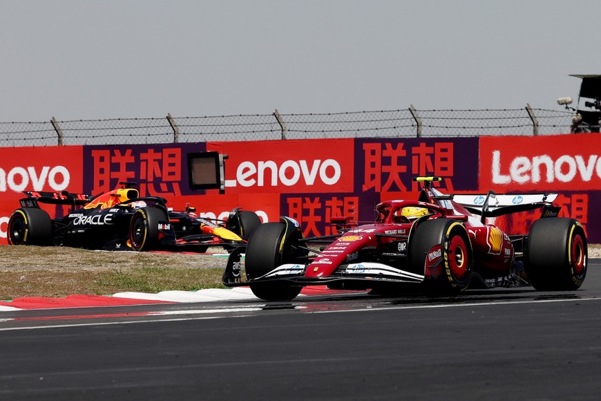 Formula One F1 - Chinese Grand Prix - Shanghai International Circuit, Shanghai, China - March 22, 2025
Ferrari's Lewis Hamilton and Red Bull's Max Verstappen during the sprint REUTERS/Tyrone Siu