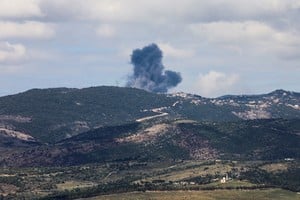 Smoke rises from Jabal al-Rihan, following Israeli strikes in response to cross-border rocket fire, as seen from Marjayoun, in southern Lebanon, March 22, 2025. REUTERS/Karamallah Daher