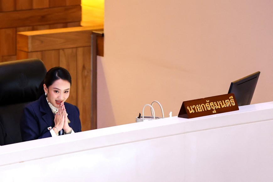 Thailand's Prime Minister Paetongtarn Shinawatra reacts after the result of a no-confidence vote, which she faced in parliament in Bangkok, Thailand, March 26, 2025. REUTERS/Athit Perawongmetha
