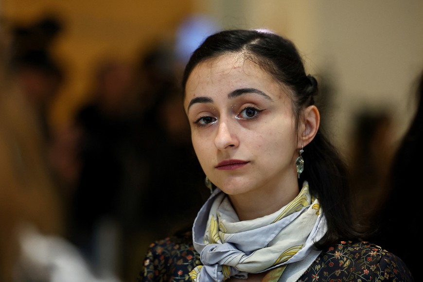 Actor Charlotte Arnould walks at the courthouse, as the trial of French actor Gerard Depardieu over accusations of sexual assault on two women, which prosecutors say took place during the filming of "Les Volets Verts", continues in Paris, France, March 27, 2025. REUTERS/Abdul Saboor